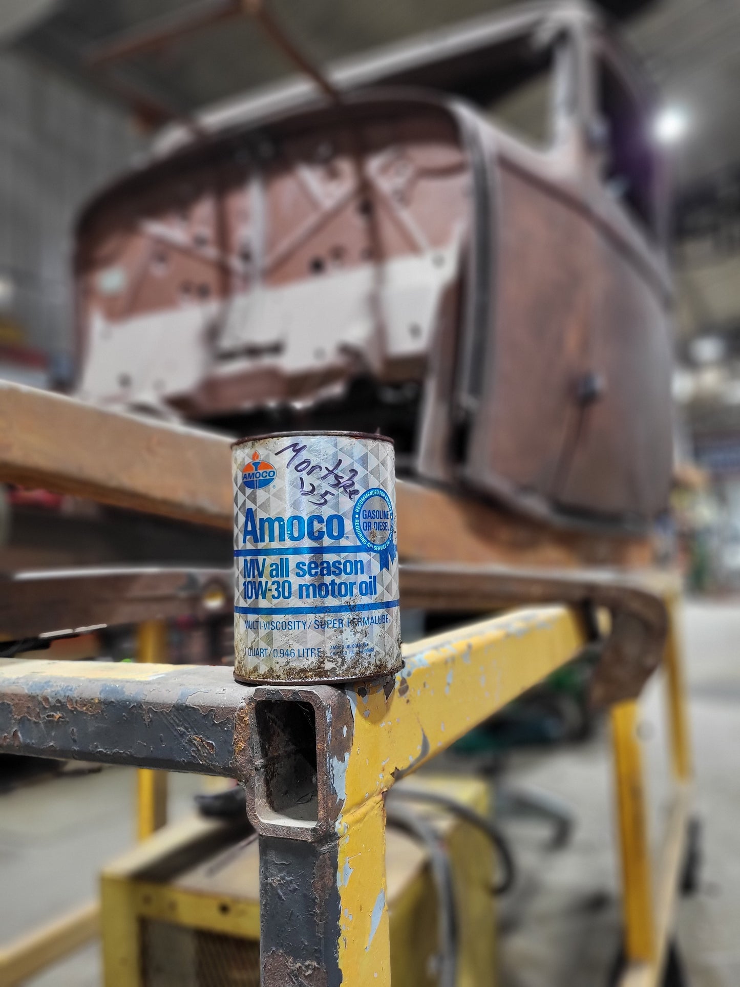 Mortske Signed Amoco Oil Cans